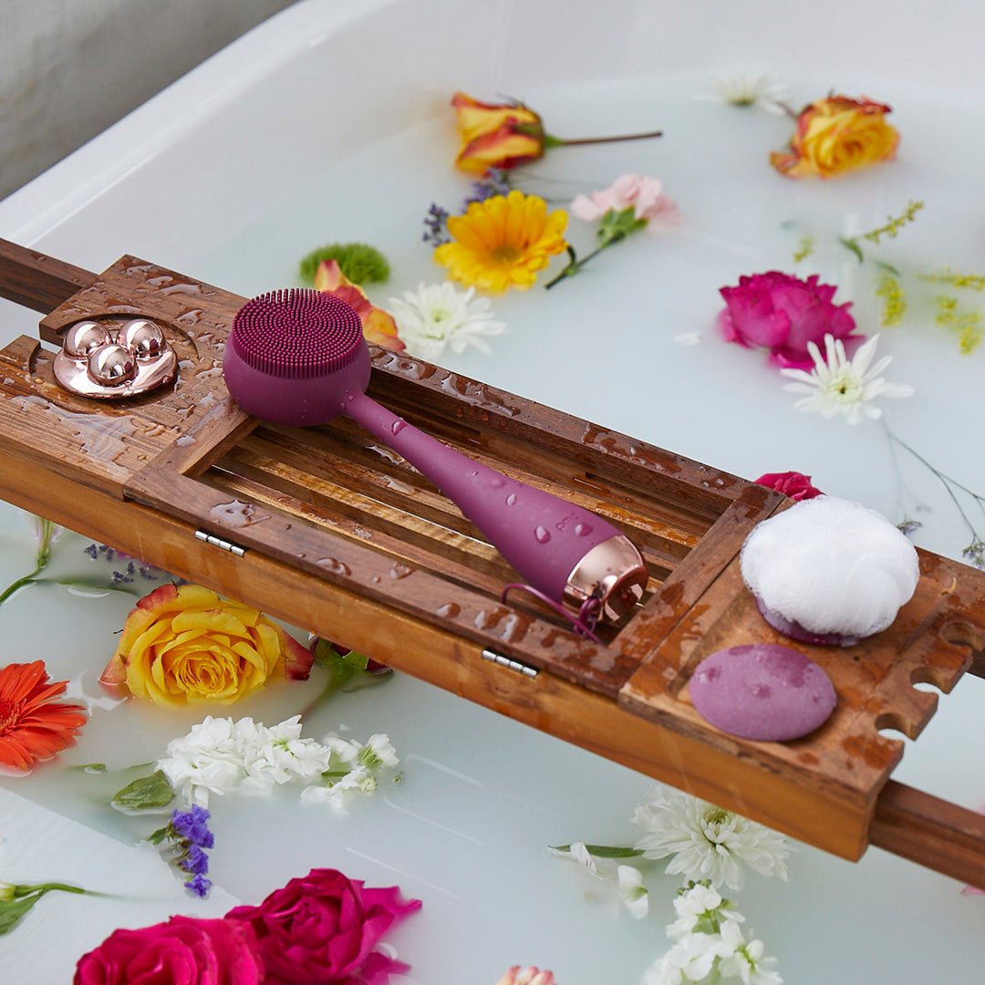 AT-4003-EBerry?Berry PMD Clean Body on bath tray surrounded by flowers