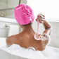 AT-4003-MBlush?Woman using PMD Clean Body in tub to cleanse her back